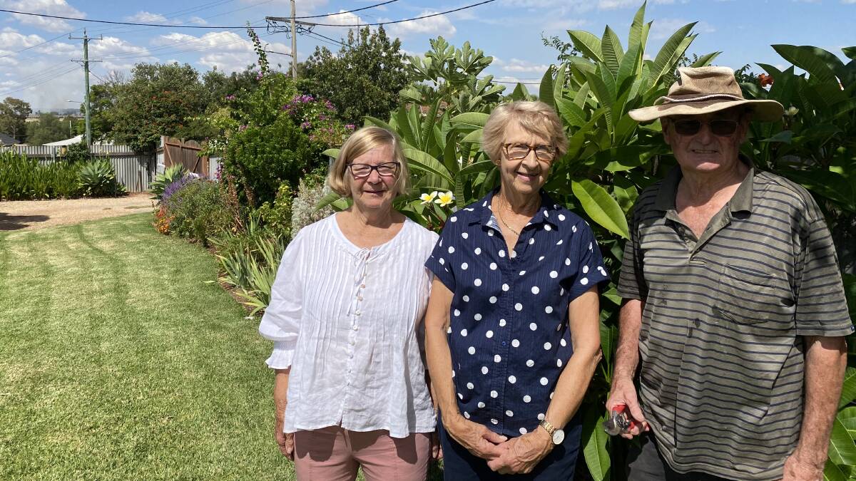 Alma (left) and Ray Herrmann with Leeton Open Garden Club president Margaret Lang. Picture by Talia Pattison