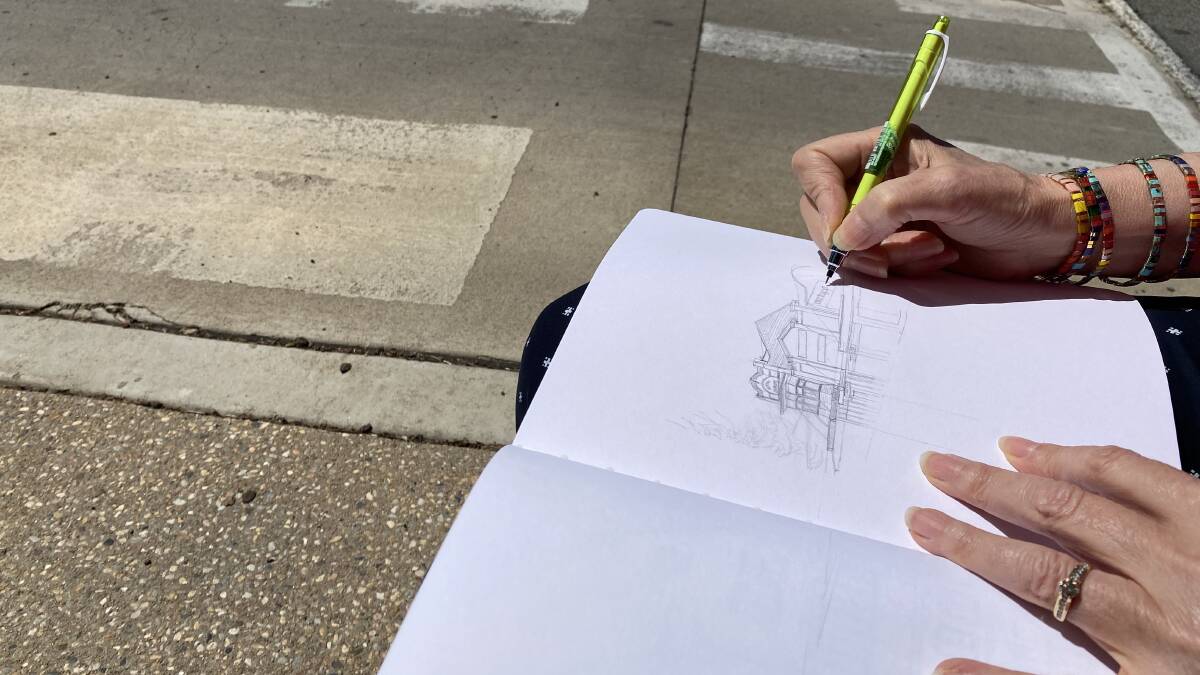 Sketching on location. Picture by Talia Pattison