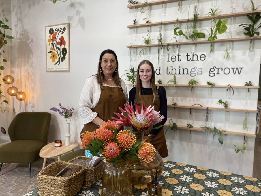 Olive and Thistle owner Caroline Chacksfield (left) and staff member Tori Harrison love the new space. Picture by Talia Pattison
