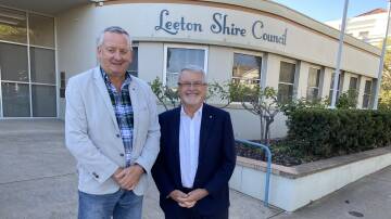 Leeton Shire Council mayor Tony Reneker (left) with NSW co-ordinator general for settlement Professor Peter Shergold. Picture by Talia Pattison