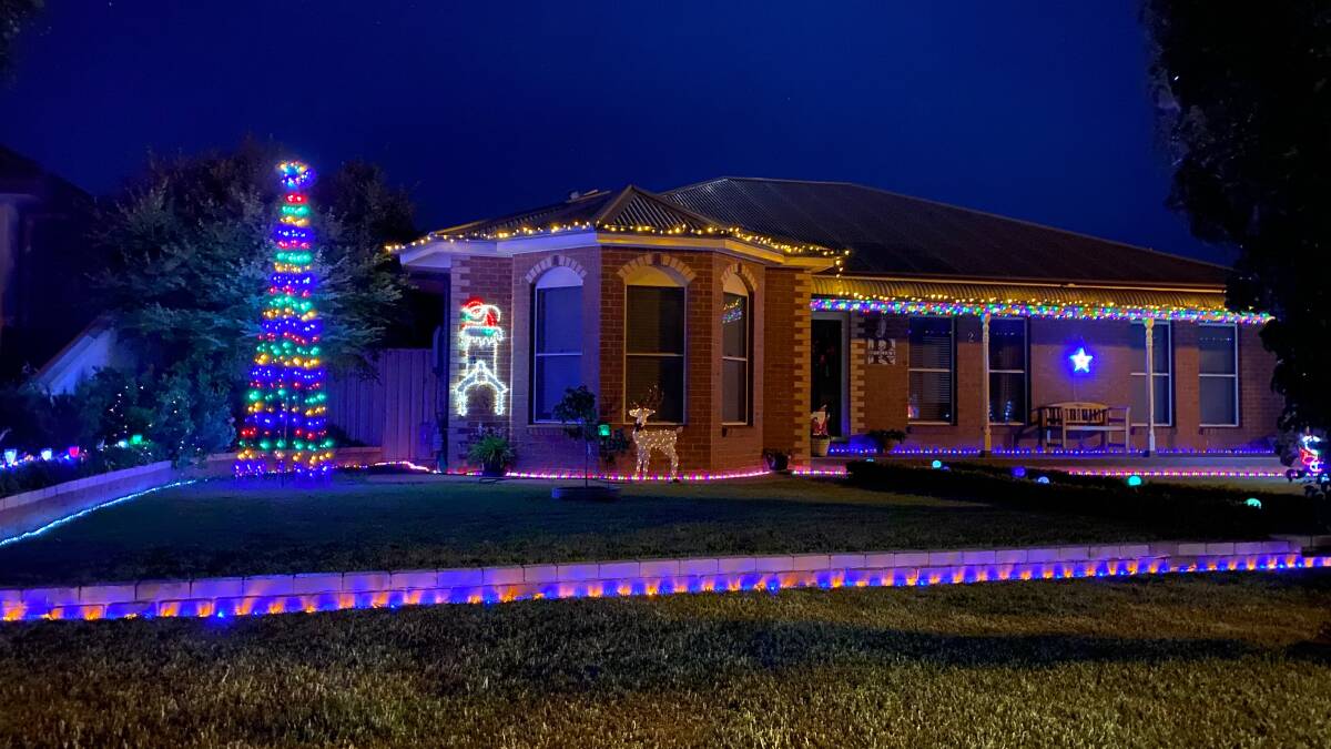Hop on the Lions train to see homes like this in Leeton lit up for Christmas. Picture by Talia Pattison