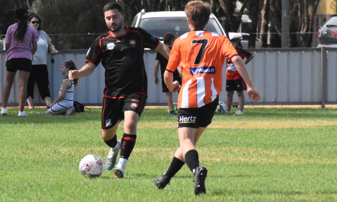 Leeton United's Aiden Amato manouvers the ball during his side's pre-season, Riverina Cup match against Wagga United earlier this year. Picture by Liam Warren