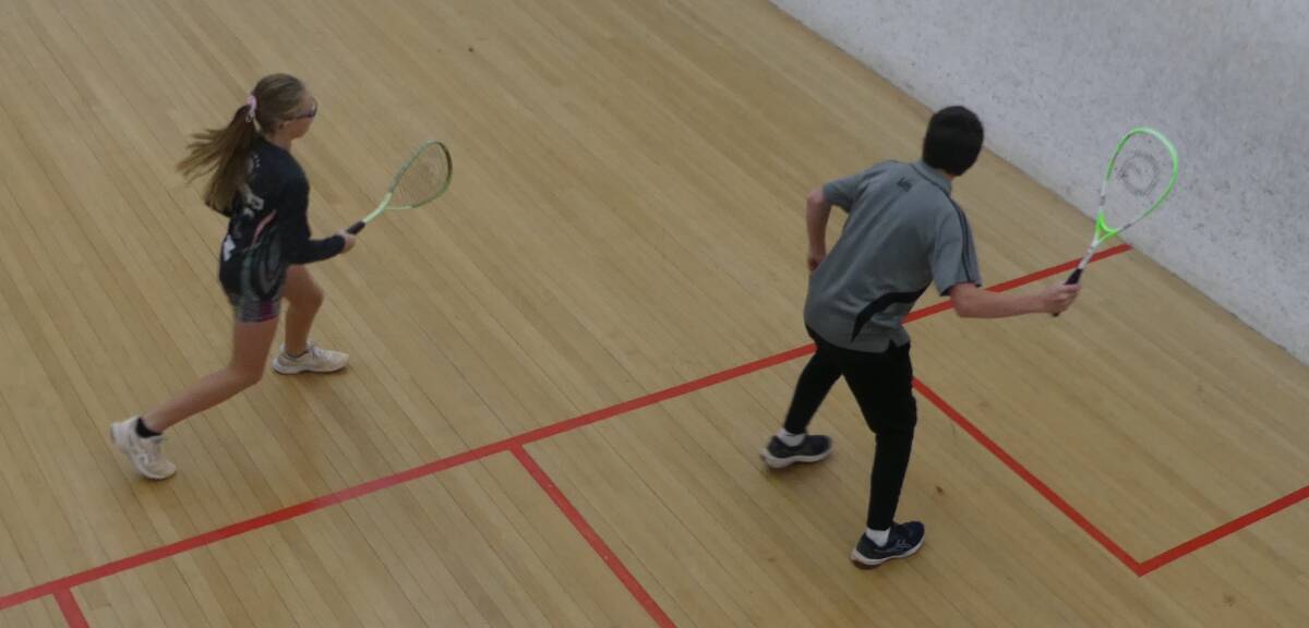 Jack Rawle lines up a forehand shot with Rose Looby on the move to make a return. Picture supplied