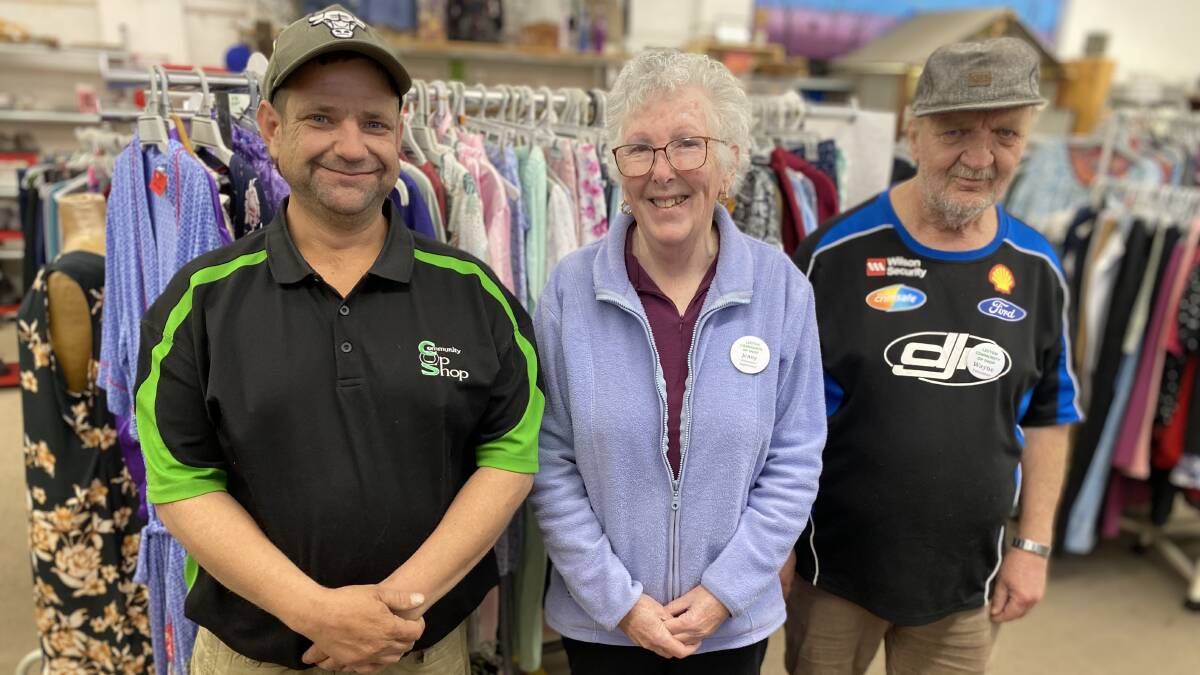 Op shop staff member Chris Thompson with volunteers Jenny Clark and Wayne Dunn. Picture by Talia Pattison 