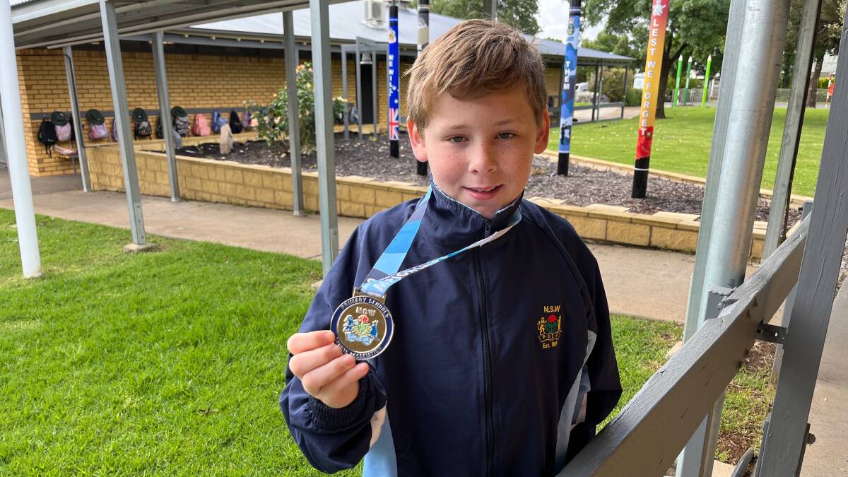 Parkview Public School's Blake Heath shows off his recent gold medal before heading off to the national titles in Brisbane later this month. Picture by Talia Pattison